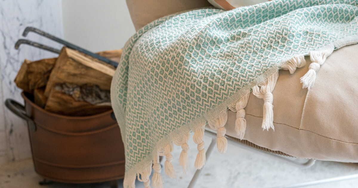 Les secrets pour conserver la douceur de votre plaid au lavage