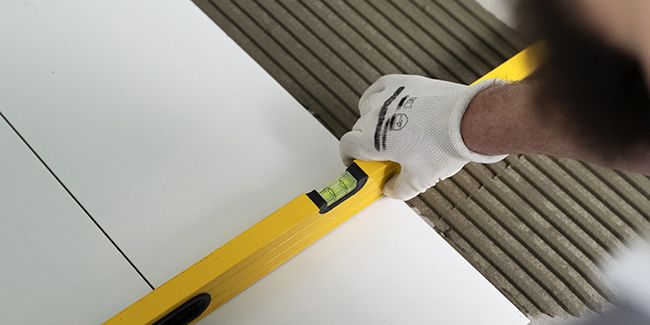 Poser du carrelage neuf sur un ancien revêtement : mode d'emploi